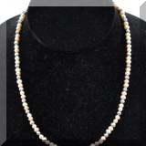 J062. Multicolored pearl necklace with sterling silver clasp 15” - $55
